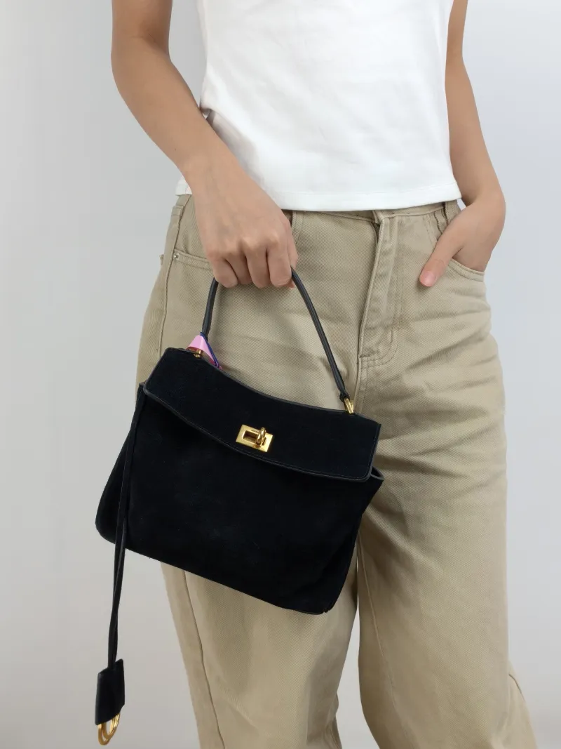 BALENCIAGA Crossbody Bag RODEO Black Suede Mini 23 × 10 × 17 cm — on-model view 1 of 2