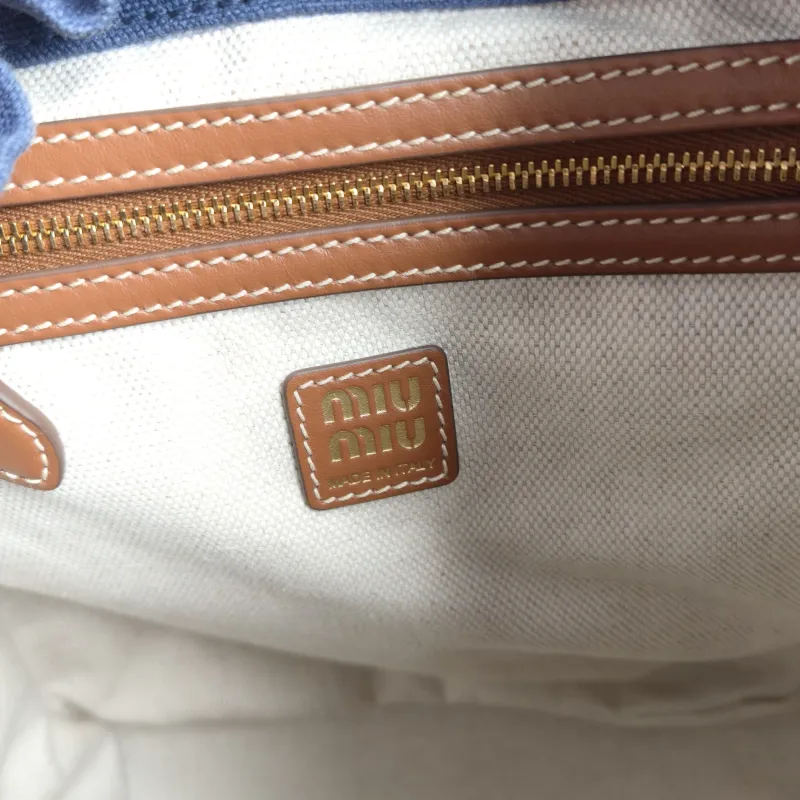 Miumiu Backpack Backpack Blue Canvas Large 25 × 12.5 × 29.5 cm — detail view 5 of 12