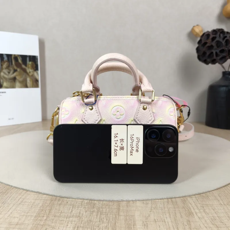 Louis Vuitton Crossbody Bag Speedy Nano Collection · Empreinte Embossed Calfskin Monogramnano16 × 7.5 × 10 cm — cover view 3 of 5