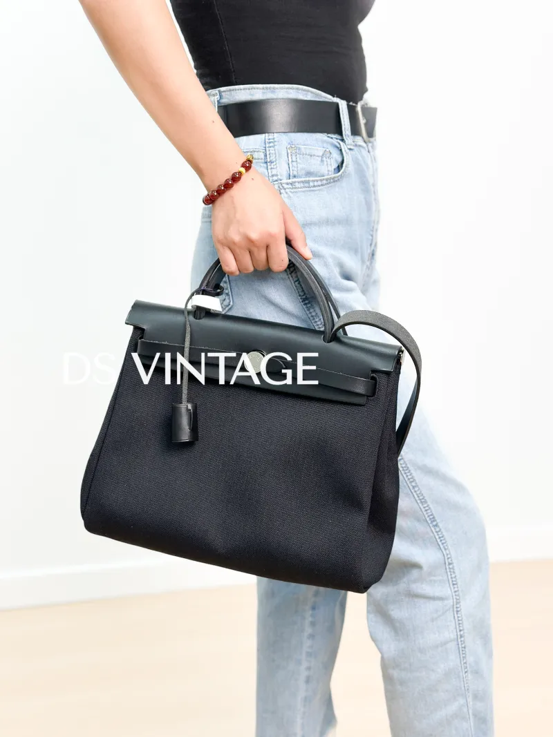 Hermès Shoulder Bag Herbag 31Black Canvas Canvas Berliner Medium31 × 10 × 25 cm — on-model view 4 of 4