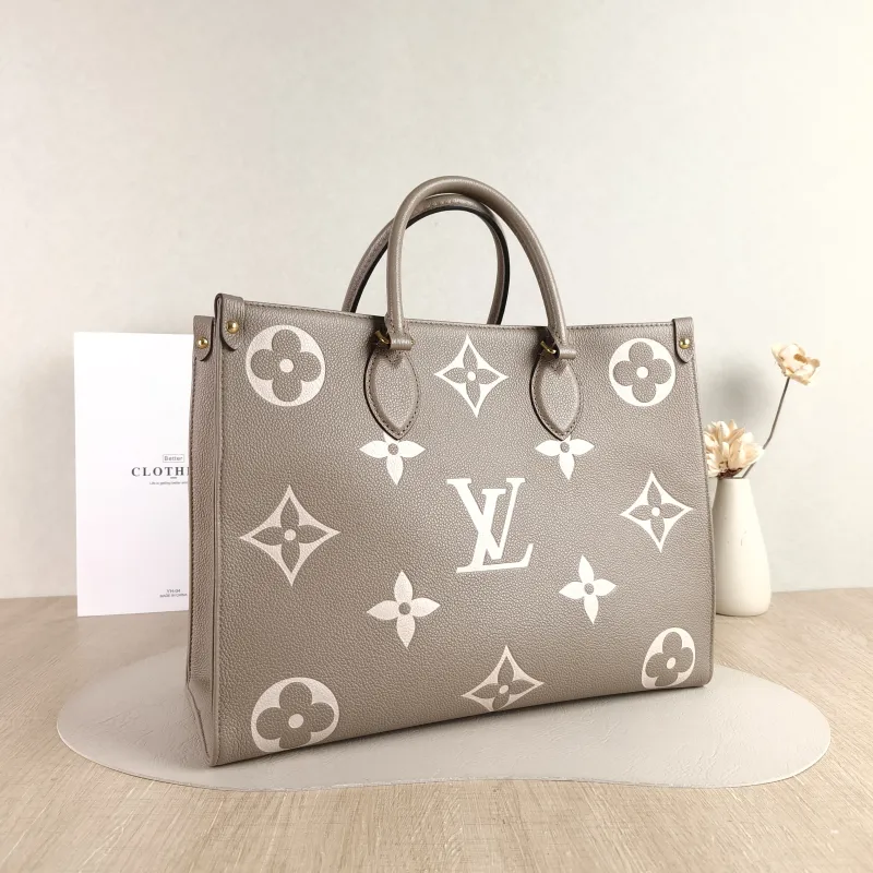Louis Vuitton Shoulder Bag Onthego Medium · White Monogram Empreinte Embossed Calfskin Medium 35 × 14 × 27 cm — cover view 4 of 5