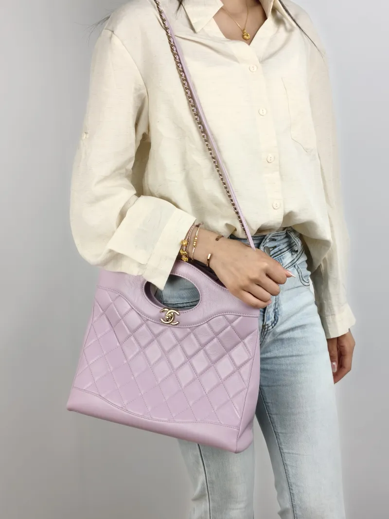 Chanel Crossbody Bag 31Bag Waxed Leather Small 30 × 9 × 29 cm — on-model view 2 of 2