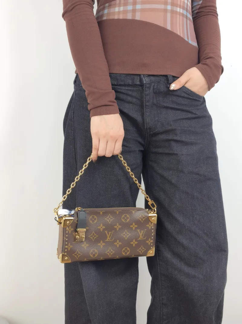 Louis Vuitton Crossbody Bag Slim Trunk Box Monogram PVC Medium 23 × 4 × 12 cm — on-model view 3 of 3