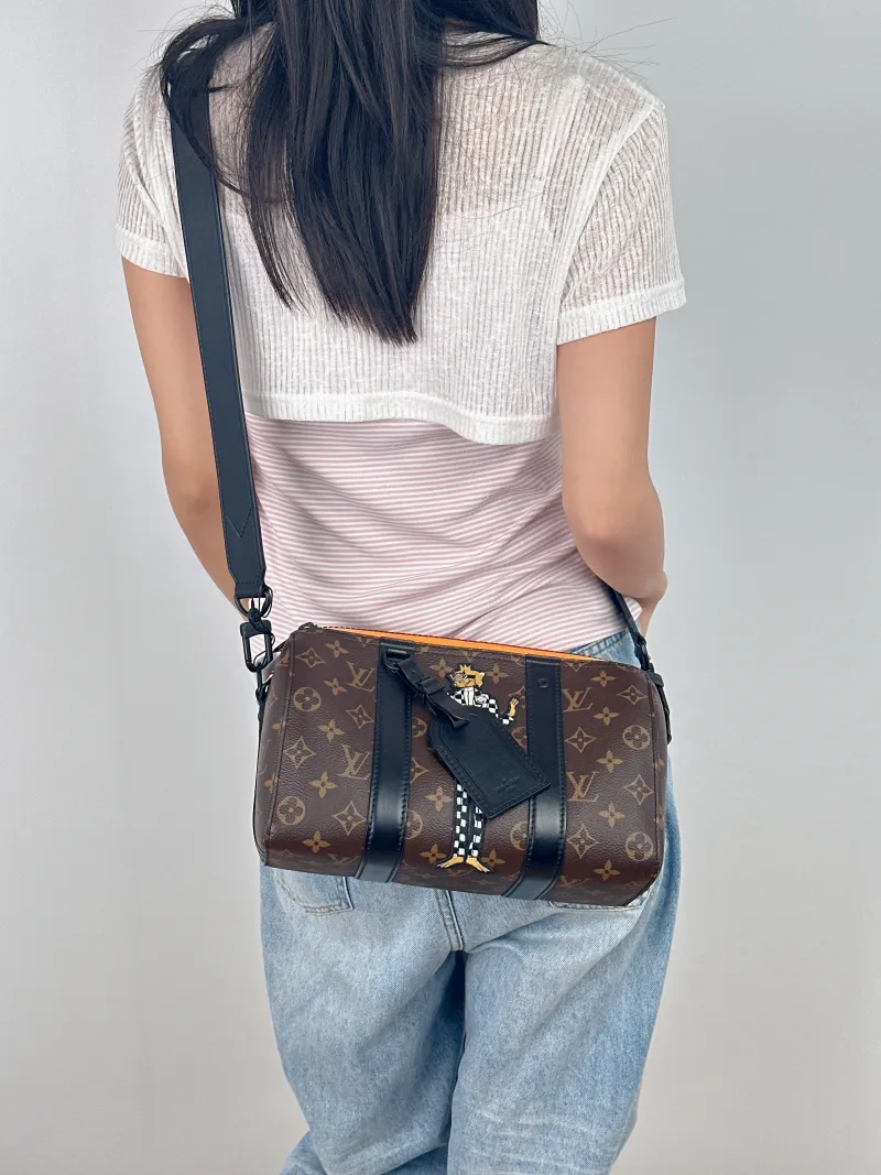 Louis Vuitton Crossbody Bag City Keepall Monogram PVC Medium27 × 13 × 17 cm — on-model view 2 of 2