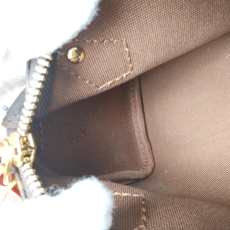 Louis Vuitton Crossbody Bag Speedy Nano Shoulder Strap PVC nano 16 × 7.5 × 10 cm — detail view 1 of 11