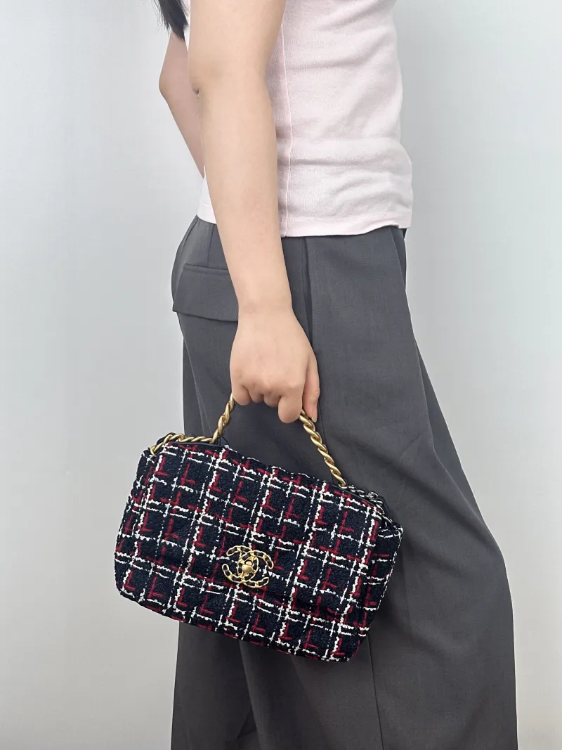 Chanel Crossbody Bag19Bag Navy Small26 × 9 × 16 cm — on-model view 1 of 2