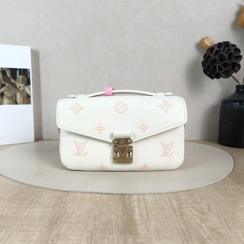 Louis Vuitton Crossbody Bag Pochette Métis East West White · Pink Monogram Empreinte Embossed Calfskin Small 21.5 × 6 × 13.5 cm