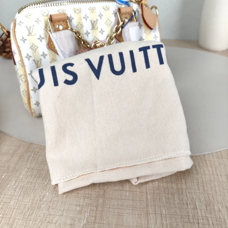 Louis Vuitton Crossbody Bag Speedy Nano White Yellow Monogram PVC nano 16 × 7.5 × 10 cm — detail view 1 of 11