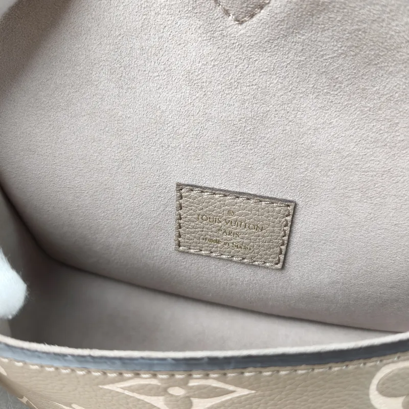 Louis Vuitton Crossbody Bag Diane Baguette Bag Empreinte Embossed Calfskin nano 19 × 6 × 10.5 cm — detail view 4 of 14