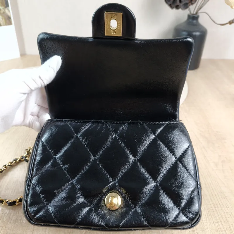 Chanel Crossbody Bag 24b Black Lambskin Mini 19 × 8.5 × 14 cm — detail view 8 of 13