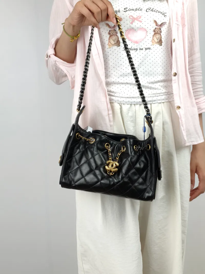 Chanel Shoulder Bag 25Bag Black Waxed Leather Calfskin Mini 20 × 12.5 × 22 cm — on-model view 2 of 3