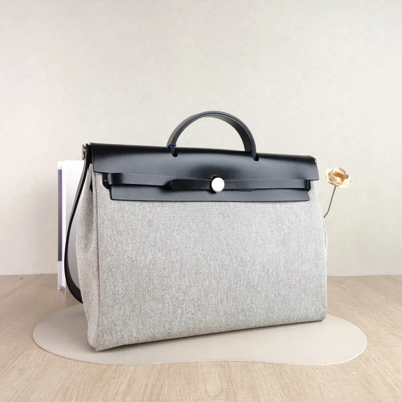 Hermès Top Handle Bag herbag messenger 39 Top Handle Bag Beige Black Canvas · Calfskin One Size 36 × 9 × 28 cm k — cover view 2 of 5
