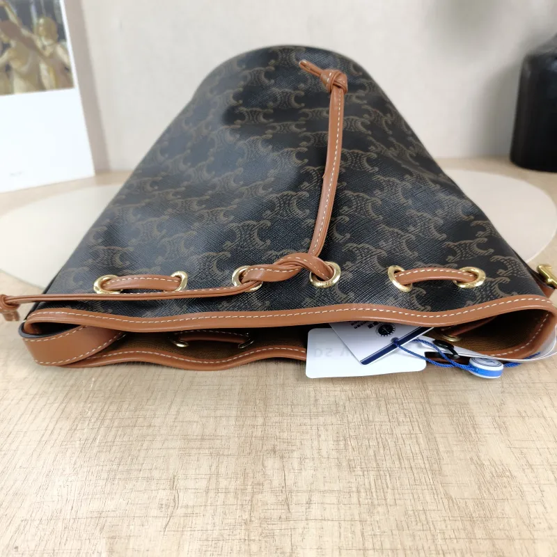 CELINE Crossbody Bag Triomphe Bucket Bag Monogram PVC Small14 × 14 × 21 cm — detail view 5 of 10