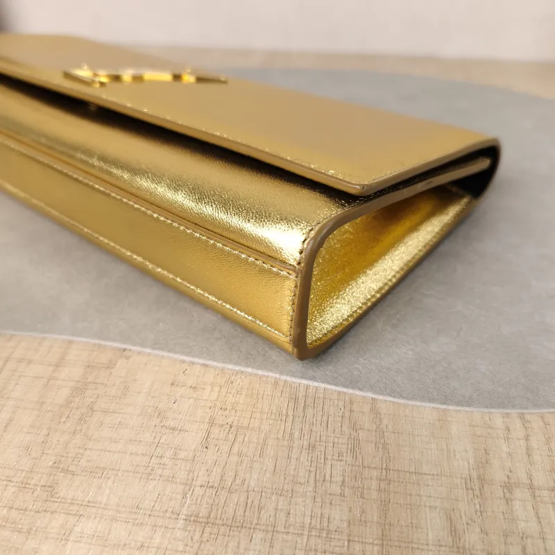 SAINT LAURENT Clutch Clutch Gold Calfskin 27 × 4 × 13 cm — detail view 10 of 12