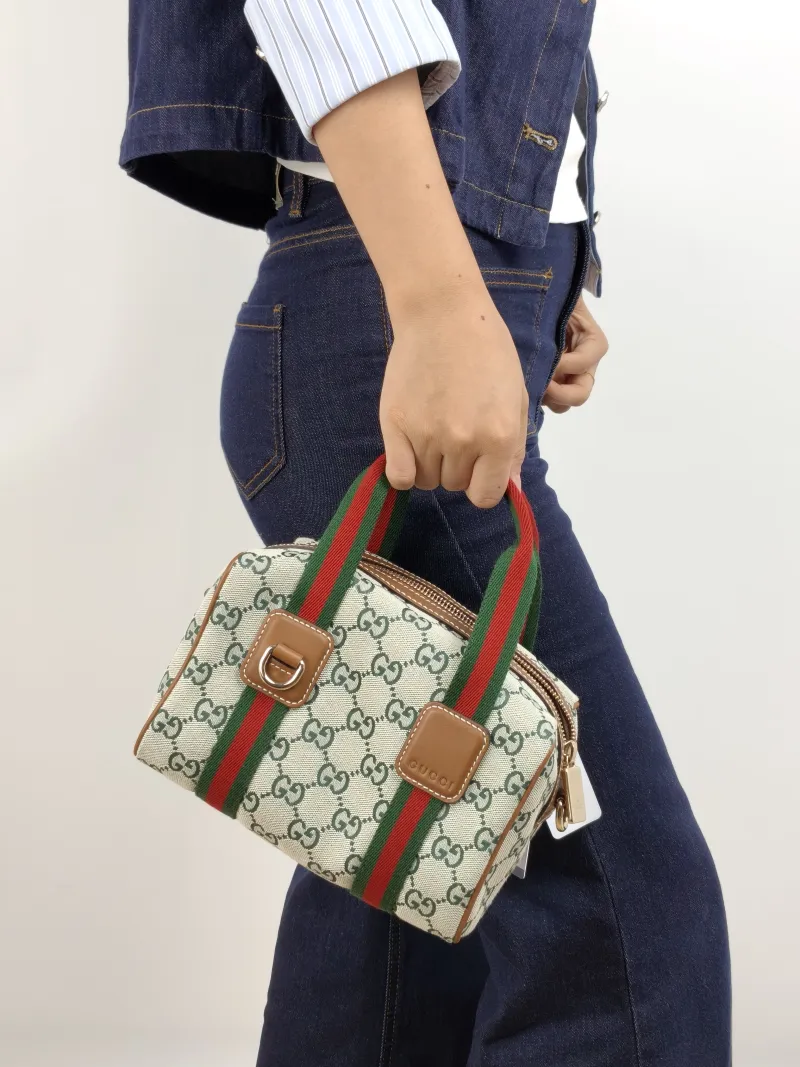 GUCCI Crossbody Bag GG Collection Green Canvas Mini 20 × 13 × 13 cm — on-model view 2 of 2