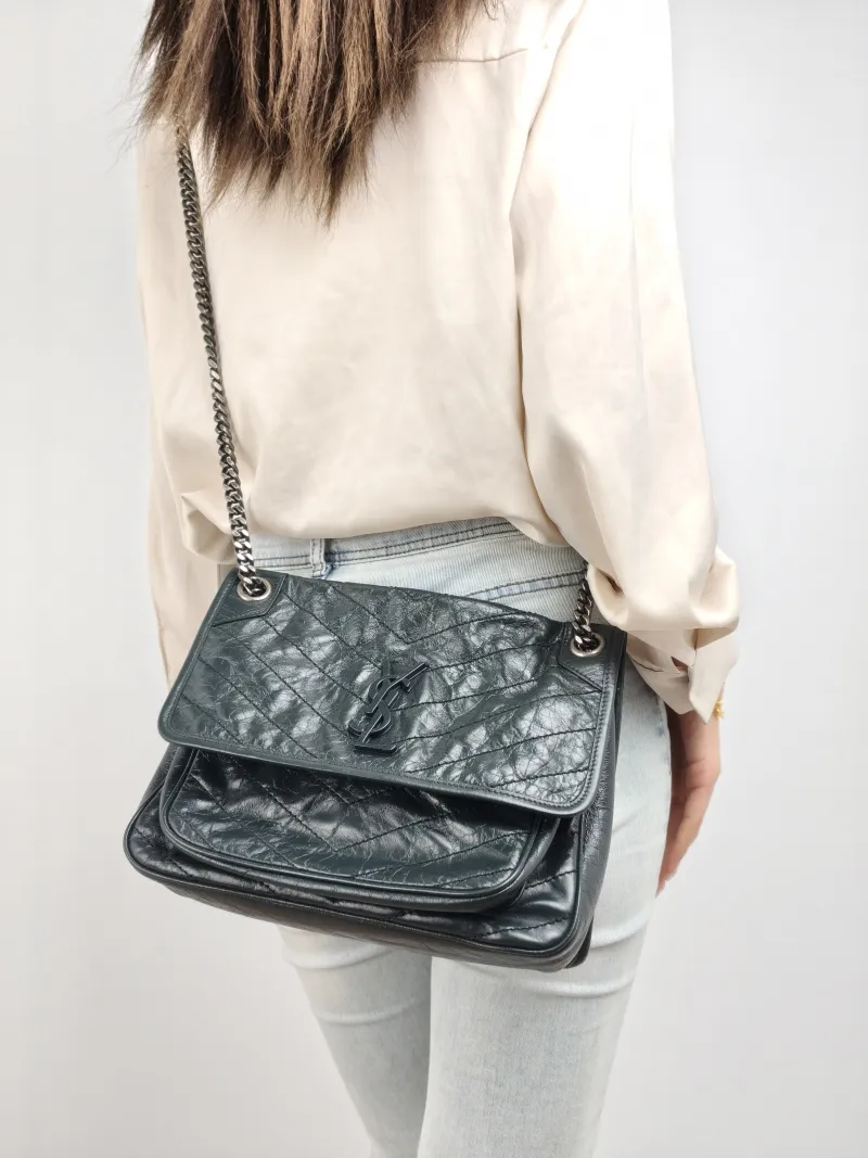 SAINT LAURENT Crossbody Bag Niki D Green Waxed Leather Medium 28 × 8.5 × 20 cm — on-model view 2 of 2