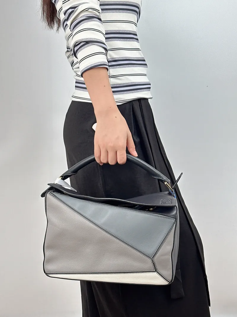 LOEWE Crossbody Bag Puzzle Colorblock Calfskin Medium 29 × 14 × 19.5 cm — on-model view 2 of 2