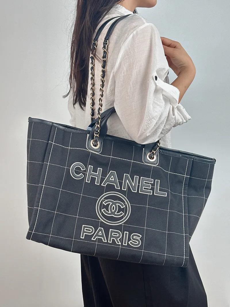 Chanel Shoulder Bag Black Canvas One Size 38 × 19 × 29 cm — on-model view 1 of 2