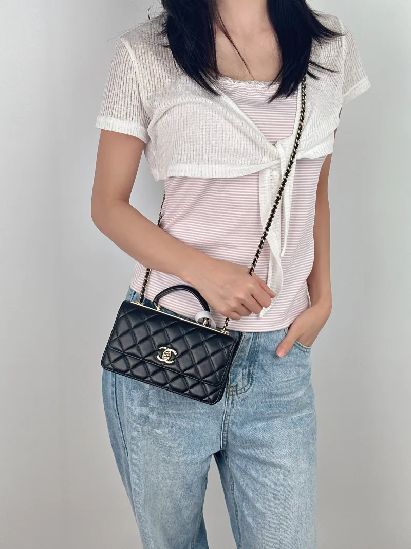 Chanel Crossbody Bag trendy cc woc Black Lambskinmini19.2 × 3.5 × 12.3 cm — on-model view 1 of 3