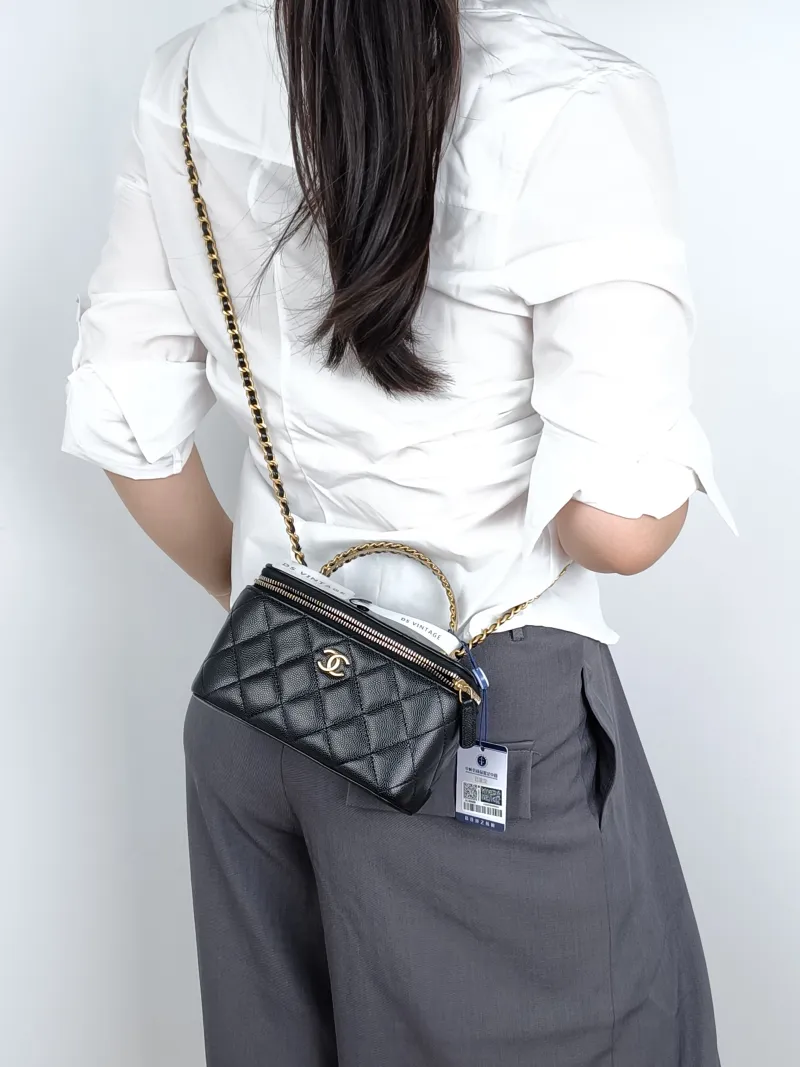 Chanel Crossbody Bag Edition Black Calfskin One Size16 × 8 × 9.5 cm — on-model view 1 of 3