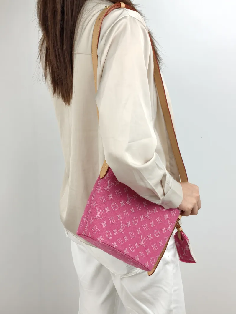 Louis Vuitton Top Handle Bag ALL IN BB Red BB 16 × 12 × 18 cm — on-model view 1 of 3