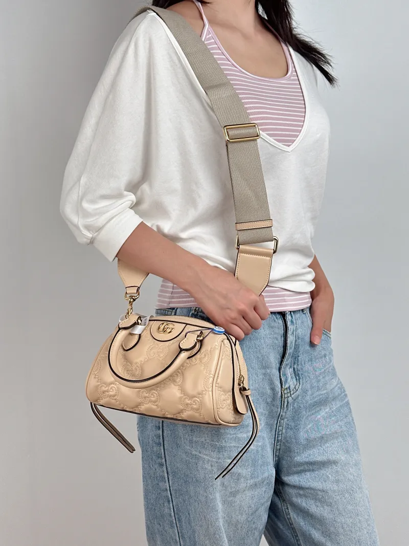 GUCCI Crossbody Bag GG matelasse Beige Calfskinmini19 × 11 × 13 cm — on-model view 1 of 4