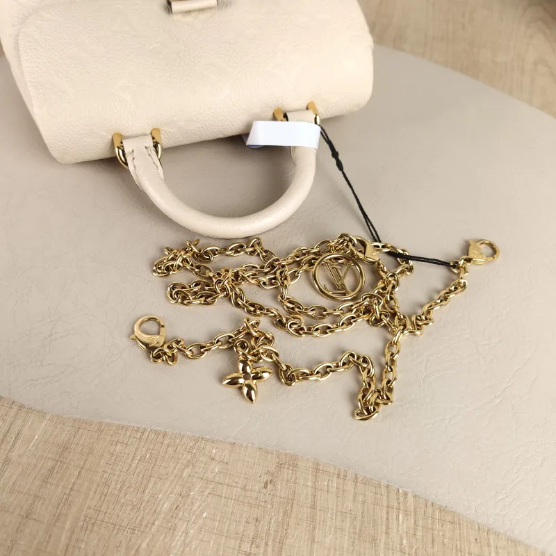 Louis Vuitton Crossbody Bag MADELEINE White Empreinte Embossed Calfskin nano 21 × 6 × 12.5 cm — detail view 11 of 11