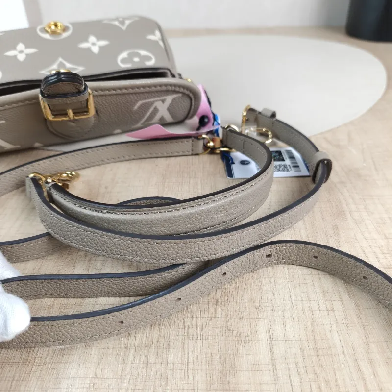 Louis Vuitton Crossbody Bag Diane Baguette Bag Empreinte Embossed Calfskin nano 19 × 6 × 10.5 cm — detail view 3 of 12