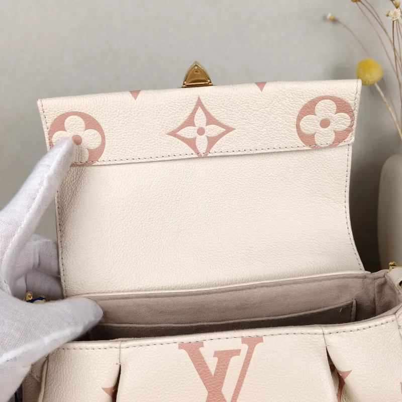 Louis Vuitton Crossbody Bag Favorite White · Pink Empreinte Embossed Calfskin Monogram Medium24 × 9 × 14 cm — detail view 11 of 14