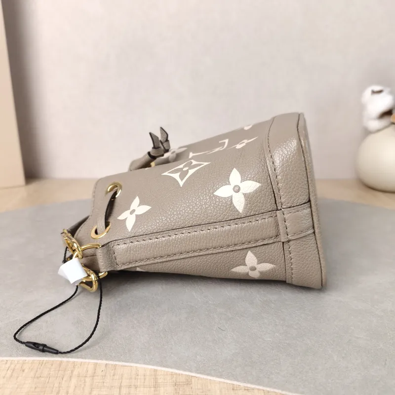 Louis Vuitton Crossbody Bag NANO NOÉ Bucket Bag Nano · White Monogram Empreinte Embossed Calfskin nano 13 × 10 × 16 cm — detail view 5 of 10