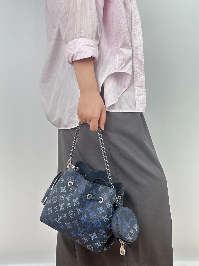 Louis Vuitton Crossbody Bag BELLA · Calfskin One Size 22 × 14 × 19 cm — on-model view 1 of 2