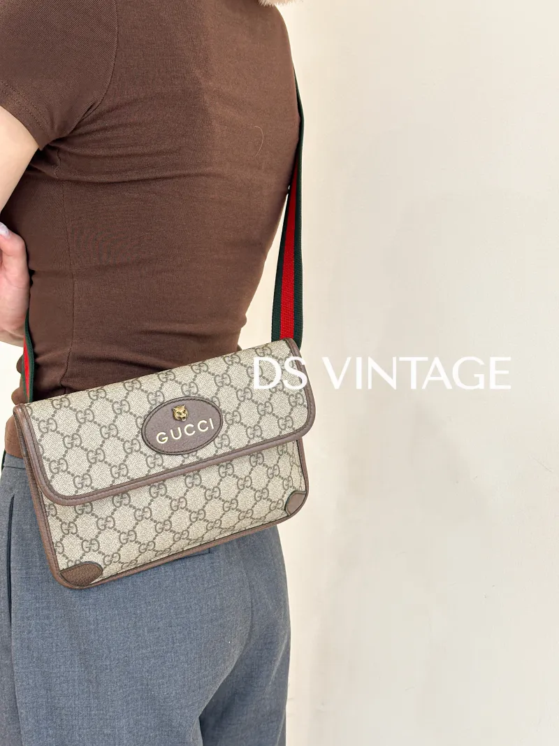 GUCCI Crossbody Bag Neo Vintage Belt Bag Monogram PVC Medium 24 × 4 × 17 cm — on-model view 1 of 3