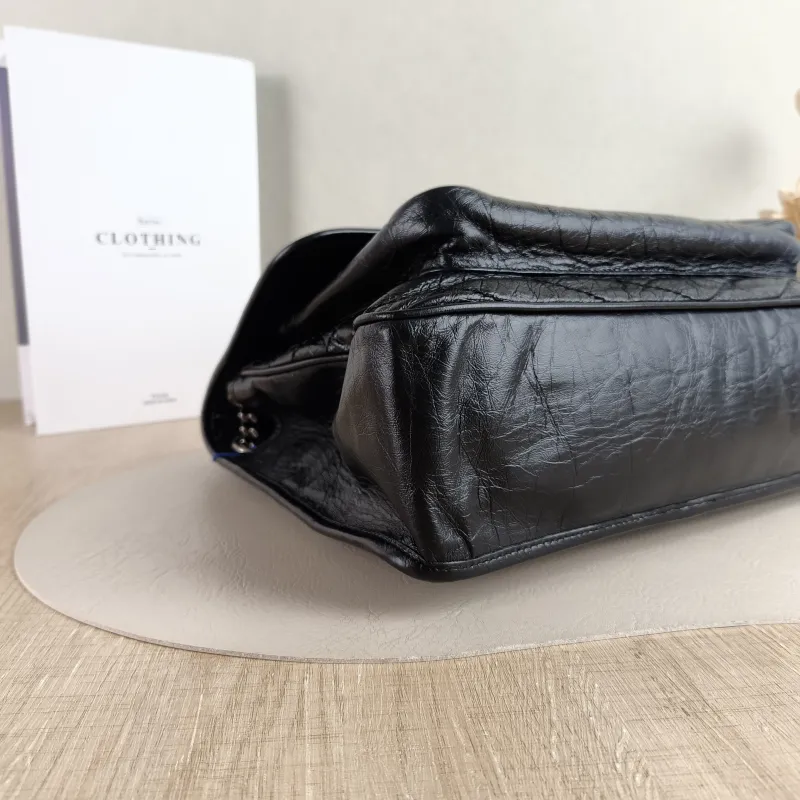 SAINT LAURENT Crossbody Bag Niki Black Calfskin Large 32 × 9 × 23 cm — detail view 9 of 13