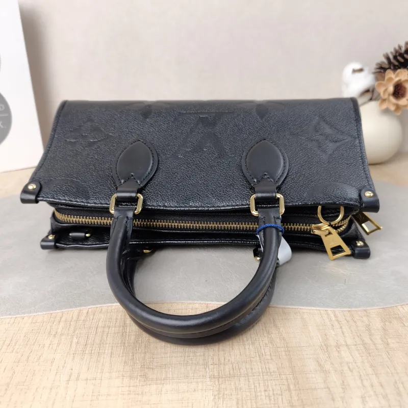 Louis Vuitton Crossbody Bag Onthego East West Two Straps Black Monogram Empreinte Embossed Calfskin Small 25 × 10 × 13 cm — detail view 9 of 11