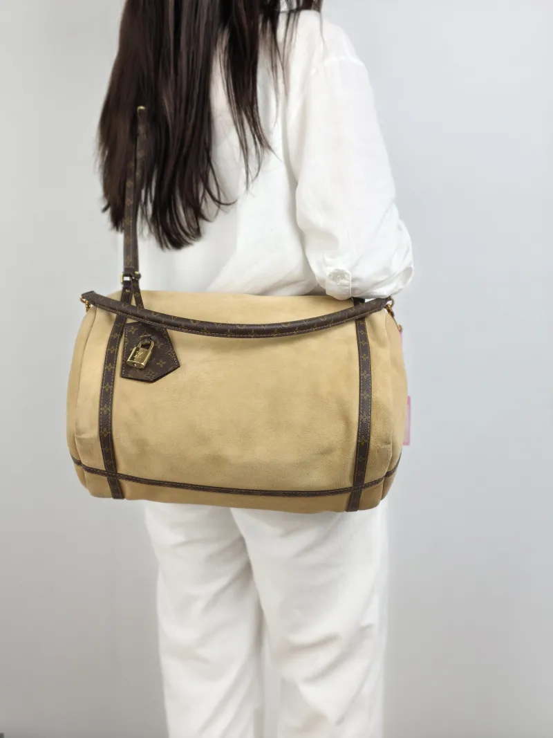 Louis Vuitton Shoulder Bag EXPRESS Shoulder Bag Suede Medium 36 × 18.5 × 24 cm — on-model view 2 of 2