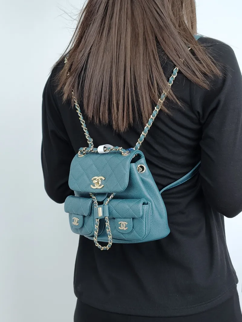 Chanel Backpack Duma Green Grained Calfskin Small16.5 × 10 × 17.5 cm — on-model view 1 of 4