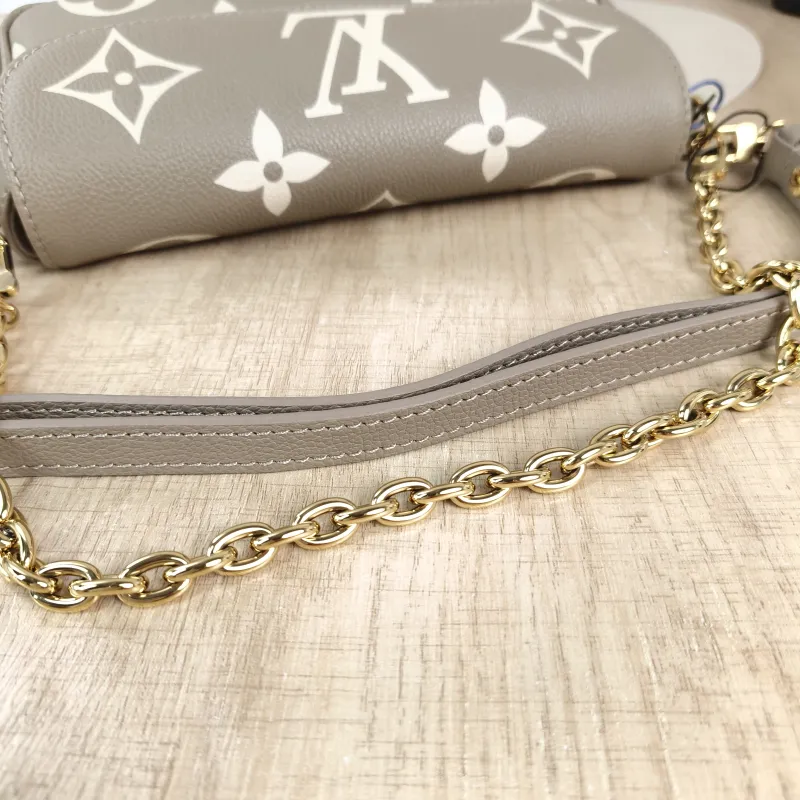 Louis Vuitton Crossbody Bag IVY Monogram Empreinte Embossed Calfskin Small 23.5 × 4.3 × 12 cm — detail view 10 of 13