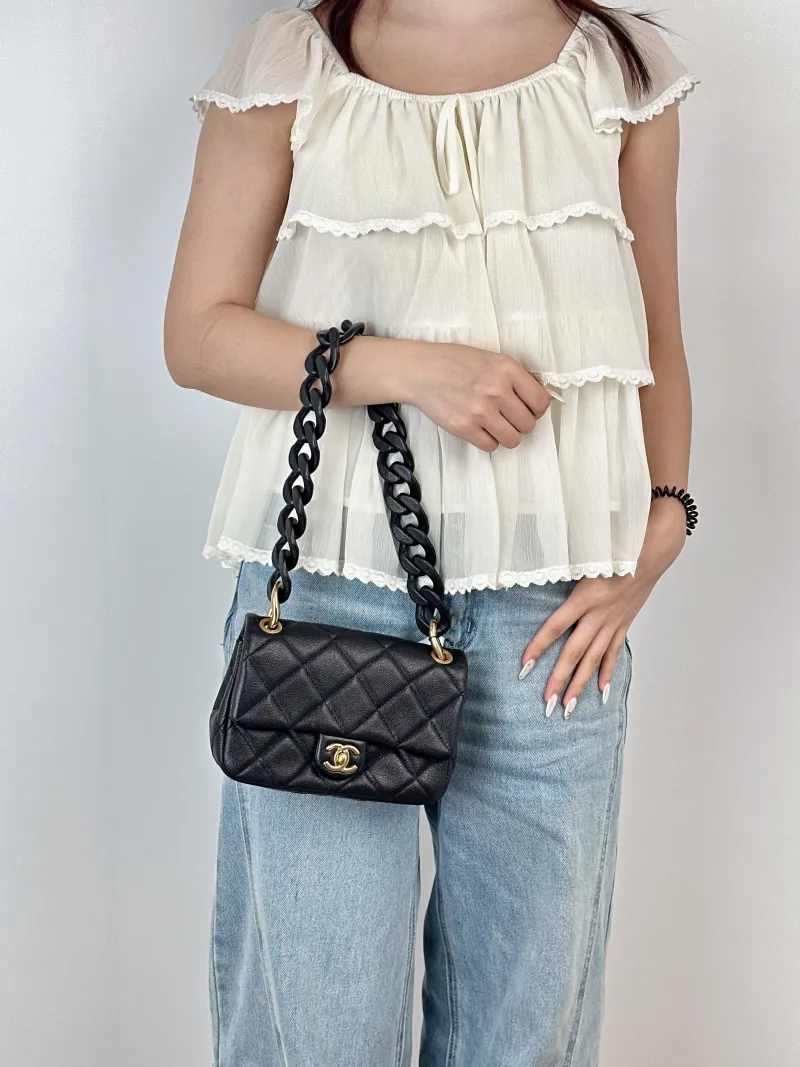Chanel Shoulder Bag24p Shoulder Bag Black Grained Calfskinmini19 × 5.5 × 14 cm — on-model view 1 of 2