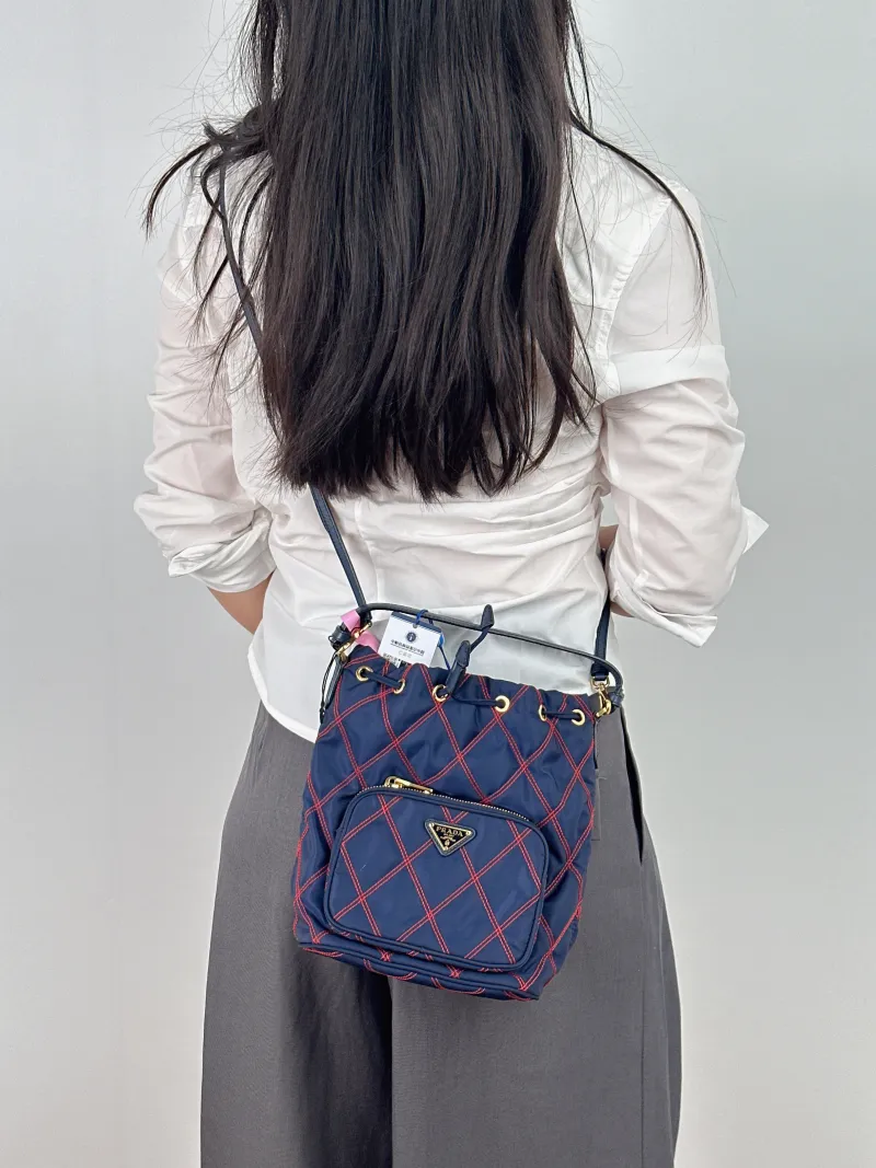 PRADA Shoulder Bag Bucket Bag Nylon One Size 18 × 12 × 23 cm — on-model view 1 of 2