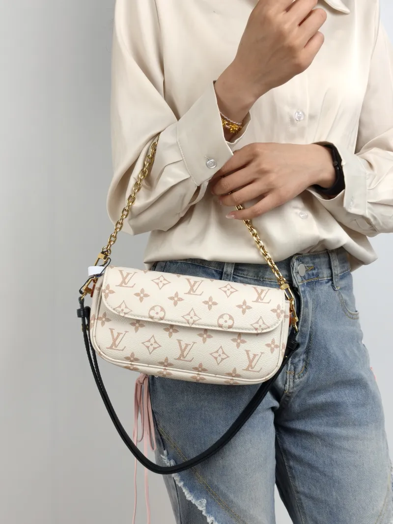 Louis Vuitton Crossbody Bag IVY · Beige PVC Small 23.5 × 4.3 × 12 cm — on-model view 3 of 3