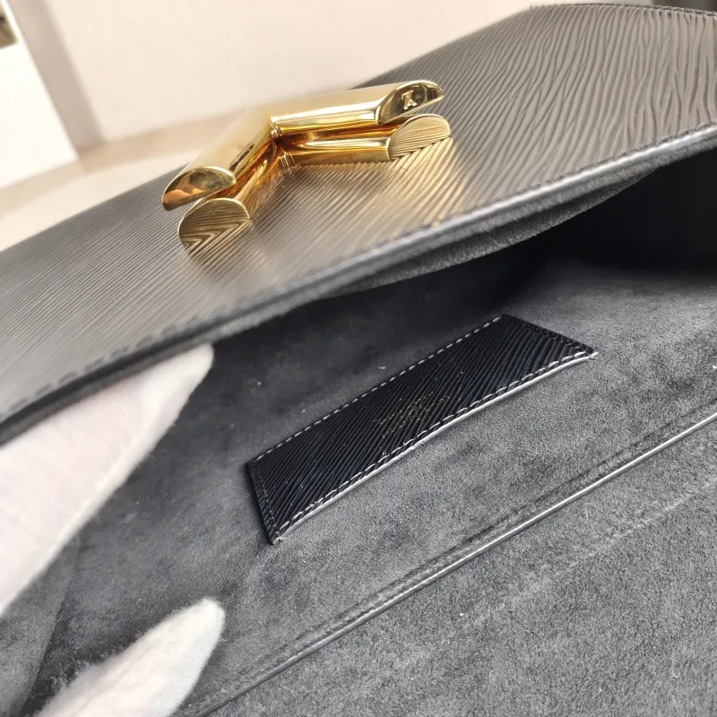 Louis Vuitton Crossbody Bag Twist Black Epi Embossed Calfskin Medium 23 × 9.5 × 17 cm — detail view 16 of 16
