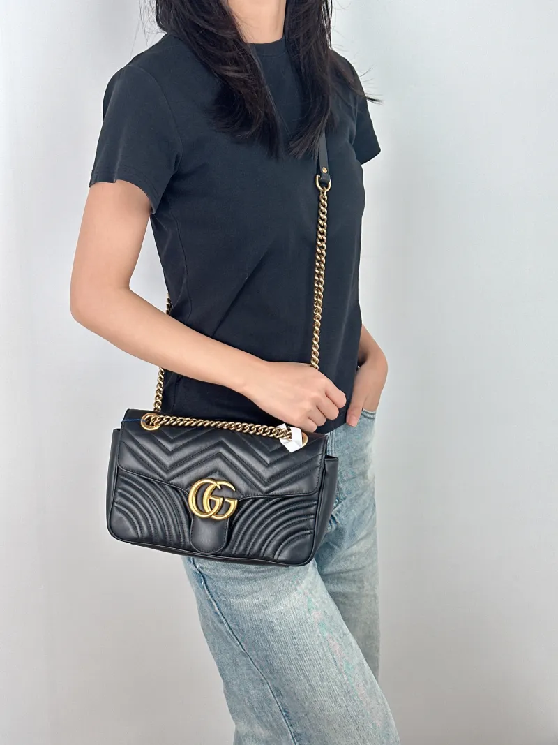 GUCCI Crossbody Bag GG Marmont Medium Marmont 26 Black CC alfskin Medium 26 × 7 × 15 cm — on-model view 2 of 2