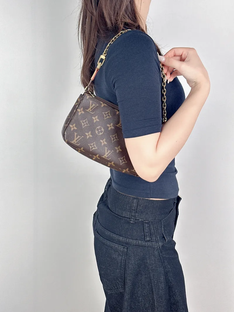 Louis Vuitton Shoulder Bag Pochette Accessoires Monogram PVC One Size22 × 4 × 13 cm — on-model view 2 of 2