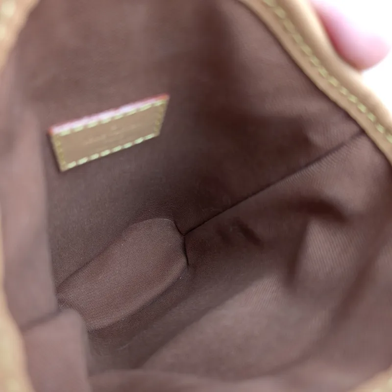 Louis Vuitton Crossbody Bag Fold Me Monogram PVC Mini 14.5 × 6.5 × 18 cm — detail view 9 of 10