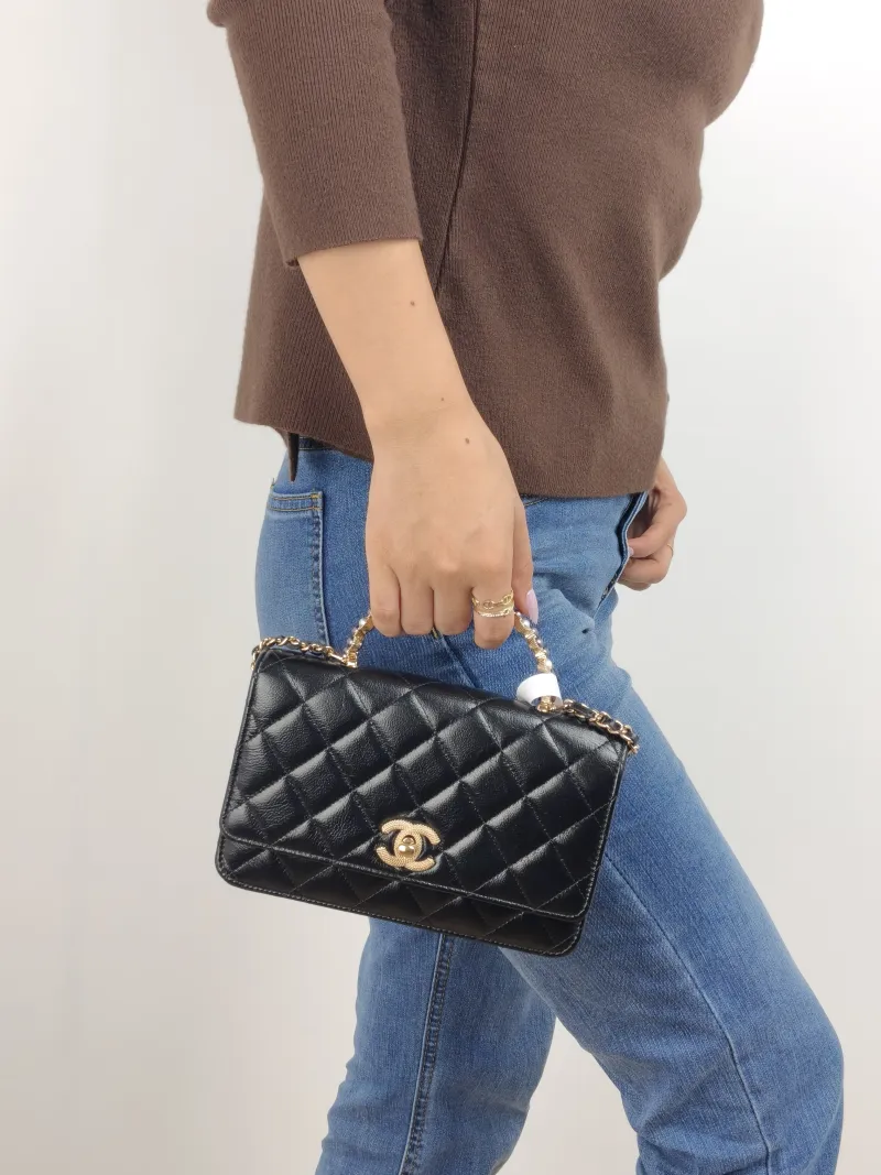 Chanel Crossbody Bag Pearl Black Lambskin 19 × 3.5 × 12 cm — on-model view 1 of 2