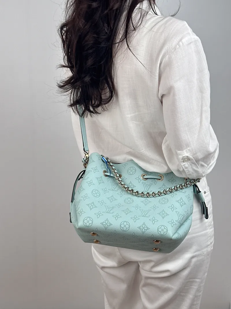 Louis Vuitton Crossbody Bag BELLA Green Calfskin 22 × 14 × 20 cm — on-model view 2 of 2
