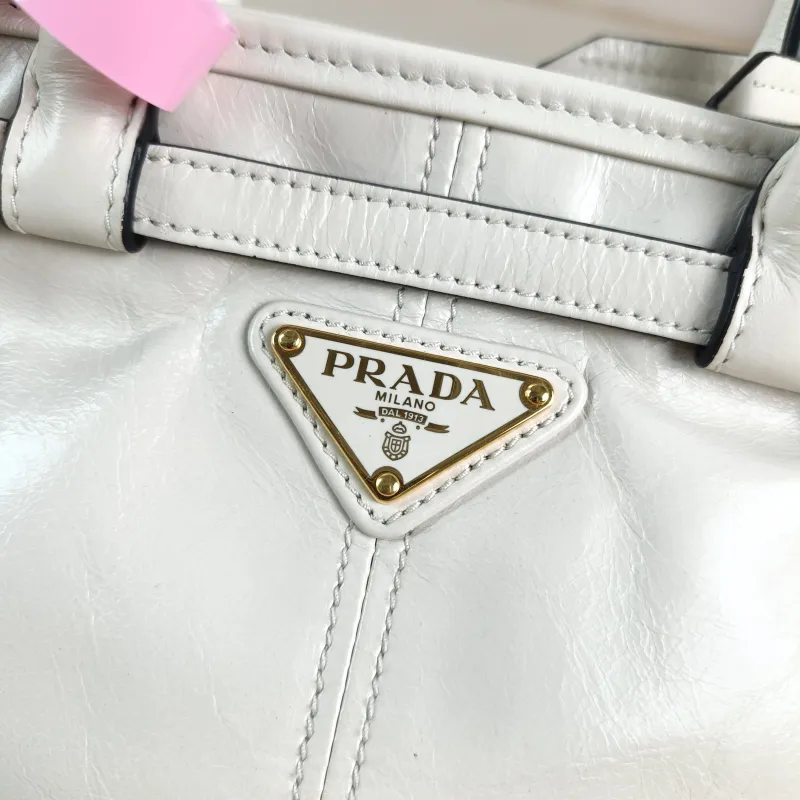 PRADA Top Handle Bag Bonnie Soft Lux White Waxed Leather Mini 23.5 × 9 × 12 cm — detail view 12 of 14