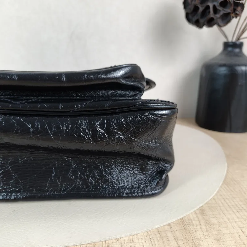 SAINT LAURENT Crossbody Bag Niki Black Waxed Leather Calfskin Medium28 × 8.5 × 20 cm — detail view 10 of 13