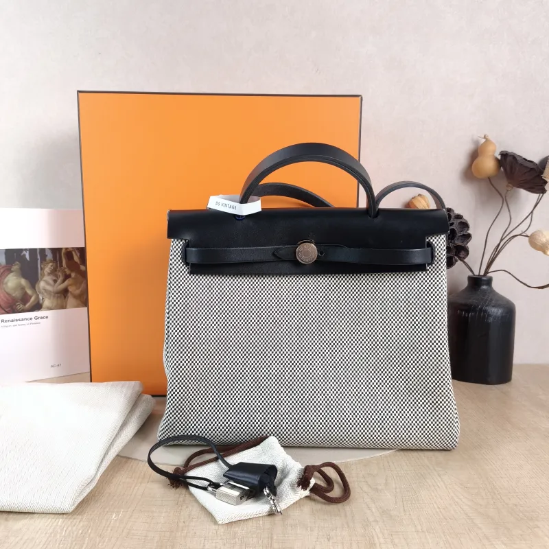 Hermès Crossbody Bag Herbag 31 Black · White Canvas Medium 30.5 × 11 × 25.5 cm u — cover view 3 of 6