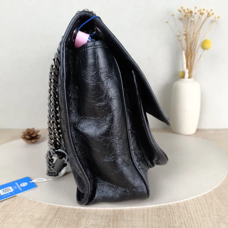 SAINT LAURENT Crossbody Bag Niki Black Waxed Leather Calfskin Large 32 × 9 × 23 cm — detail view 3 of 15